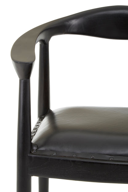Caol in Black Chair